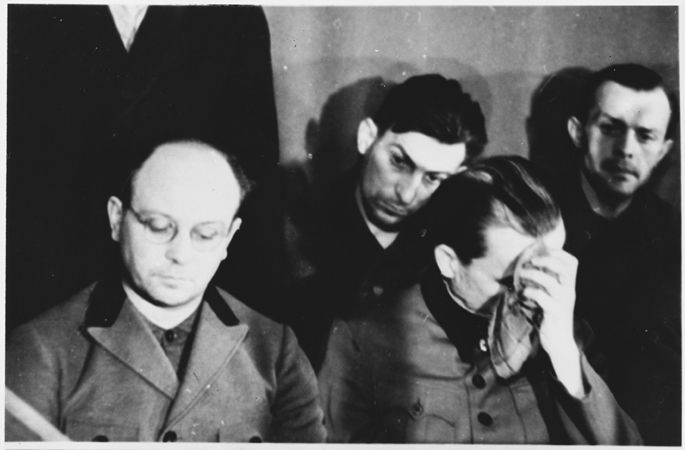 Defendants Anton Kaindl -left and Gustav Sorge (back middle) at the Sachsenhausen concentration camp war crimes trial in Berlin